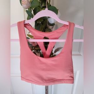 🎉 Brisos padded sports bra in a coral color, great condition, size medium.